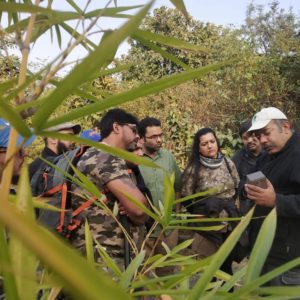 Trainer explaining camera-trap set up